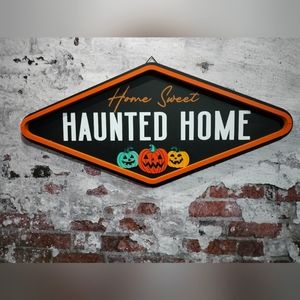 Home sweet haunted home sign